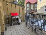 Deck space with propane BBQ grill. 2 deck chairs and table for guest-use. 